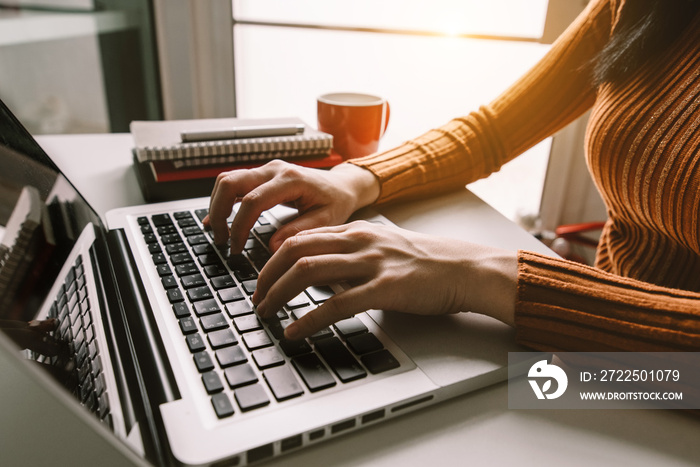 Social media and Marketing virtual icons screen of businesswoman typing keyboard with laptop compute