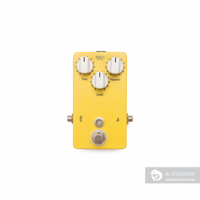 Yellow Guitar Pedal Isolated On White Surface