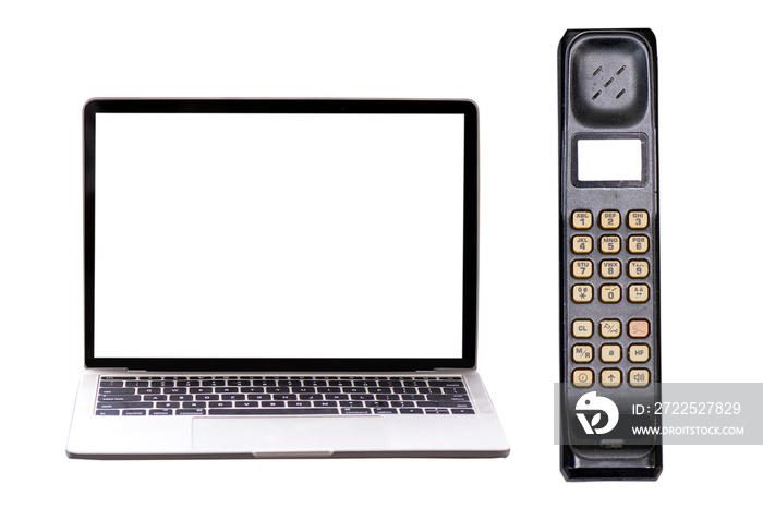 Laptop computer with blank screen and vintage Mobile isolated on white background