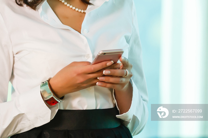 Close up of a girl using mobile smart phone