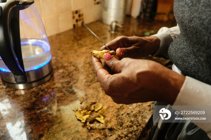 Grandma making ginger Tea