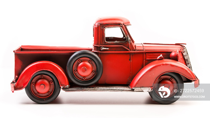 Red pickup truck. Old vintage metal pickup truck. Retro car on white isolated background.