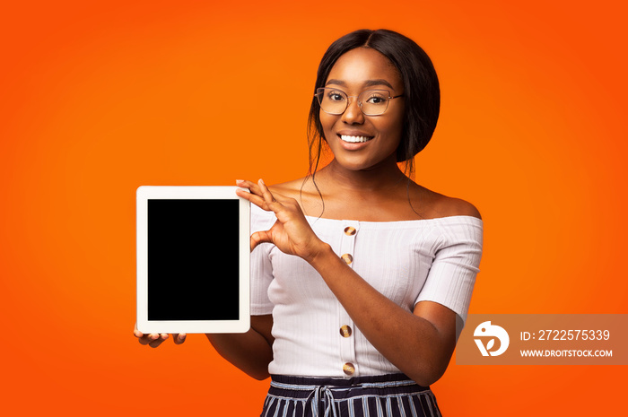 Afro Lady Showing Tablet Empty Screen Standing In Studio, Mockup