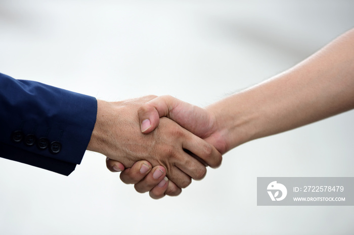 Handshaking in business cooperation The agreement