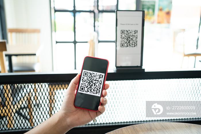 Qr code payment. E wallet. Man scanning tag accepted generate digital pay without money.scanning QR code online shopping cashless payment and verification technology concept