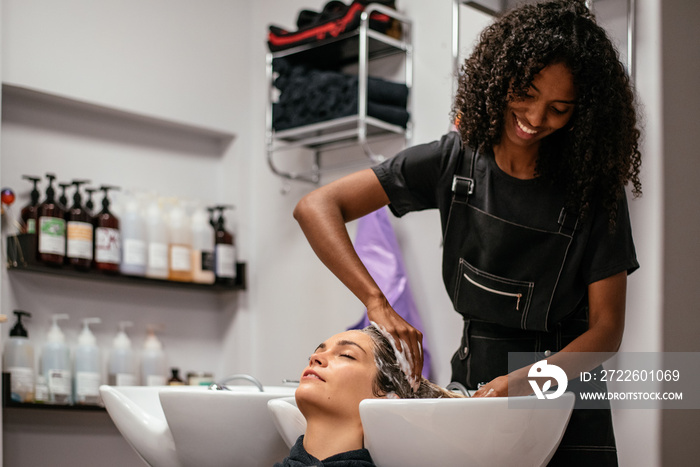 Woman having her hair washed in a salon