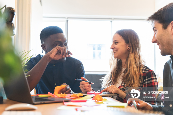 Happy employee people at startup home office