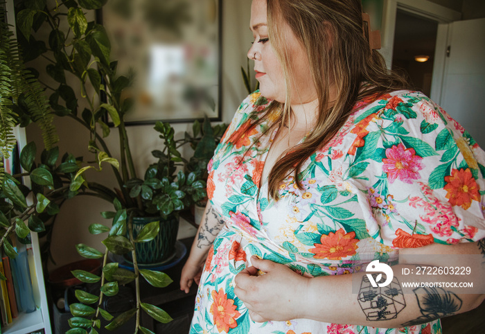 closeup of woman looking at plants