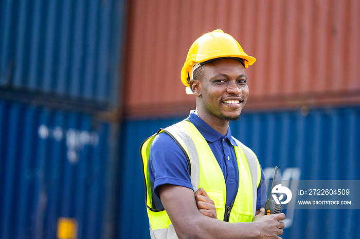 American African engineer Smiling at construction building background. Evolution construction concept.