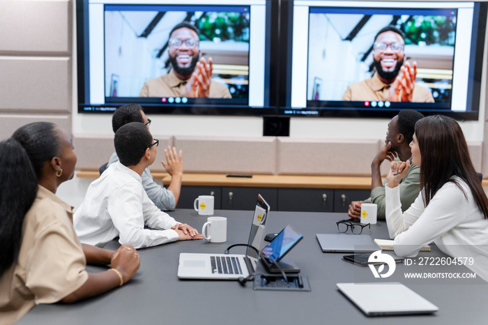 Business people attending video conference