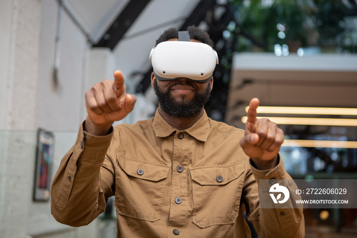 Man using VR goggles at home