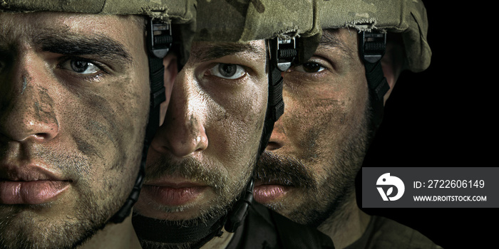 Close up portrait of young male soldiers. Men in military uniform on the war on black background. Depressed and having problems with mental health and emotions, PTSD, rehabilitation. Collage.