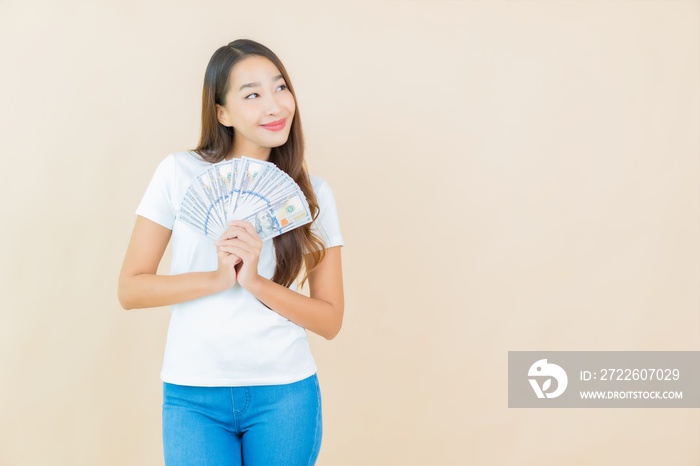 Portrait beautiful young asian woman with a lot of cash and money