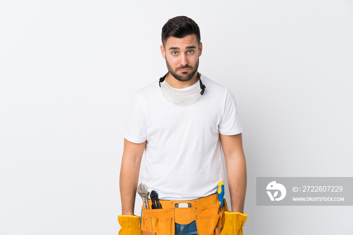 Craftsmen or electrician man over isolated white background sad