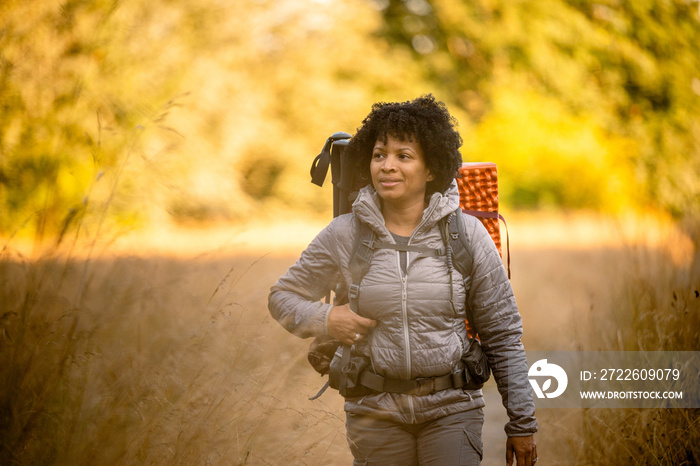 U.S. Army female soldier putting in the miles with an early morning hike in the NorthWest.