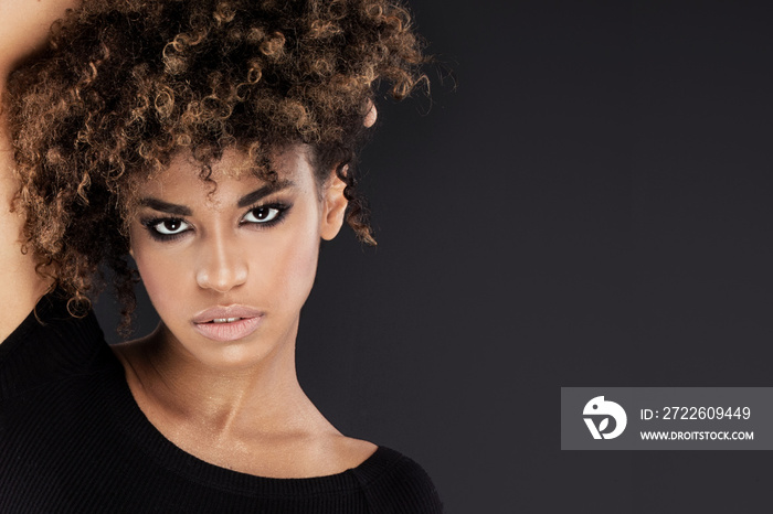 Portrait of girl with afro hairstyle.