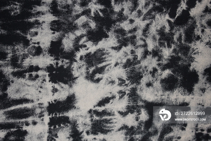 black and white Tie dye green background with layers of dye pattern fading from green to white dye fabric textile