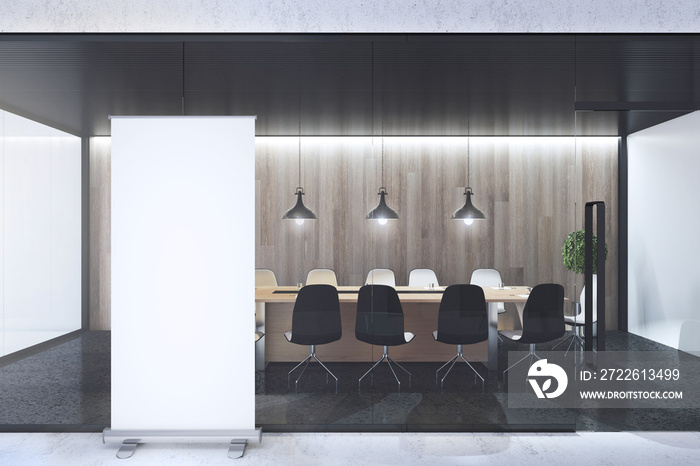 Modern concrete and wooden meeting room interior with empty white mock up poster stand, table, computer, monitors, armchairs and decorative plant behind glass wall partition. 3D Rendering.