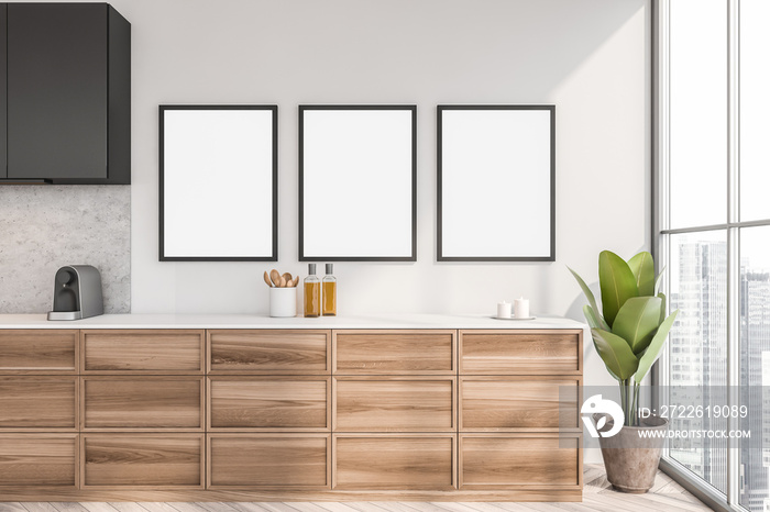 Wooden kitchen interior with kitchenware near window, three mock up posters