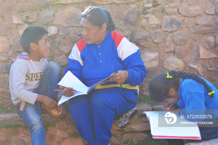 Native american woman teaching kids.