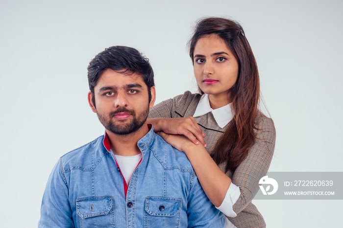 indian couple in love posing at studio white background