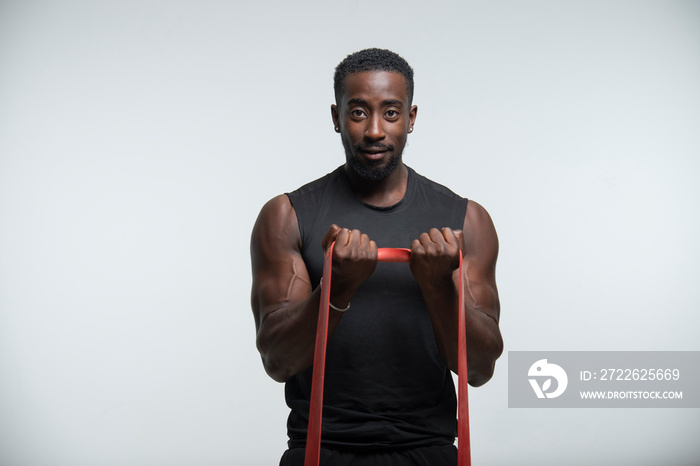 Man training with resistance band