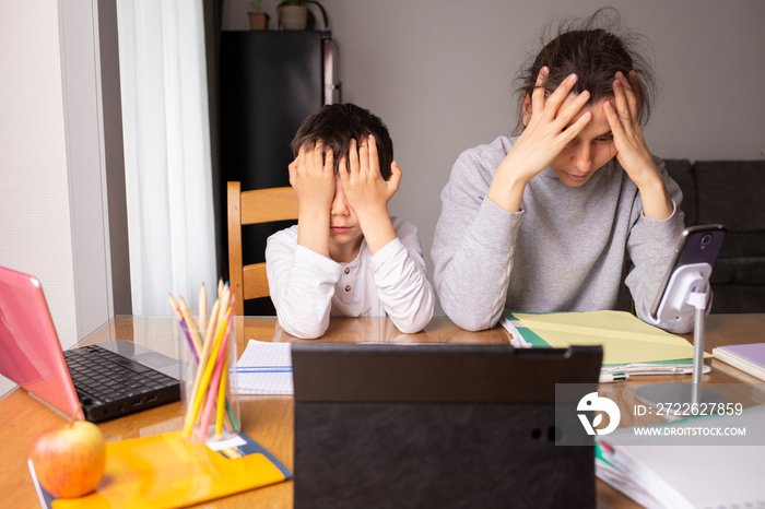 parents teaching kids at home, home school education, Mother helping her son to do homework, stress