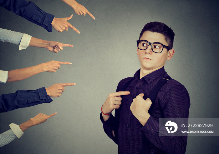 Anxious man judged blamed by people pointing fingers at him