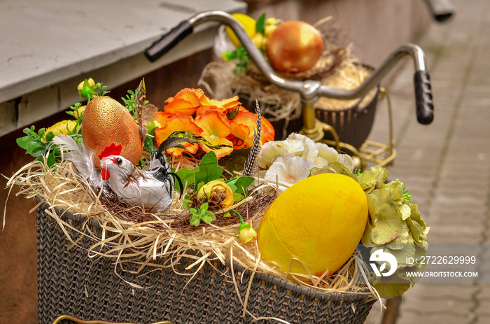 Creative Easter decoration with eggs in the bicycle basket.