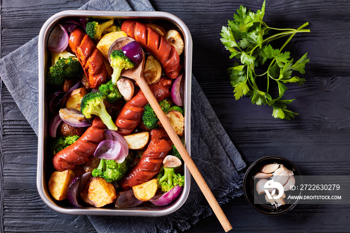 Sausage and vegetable traybake, top view, close-up