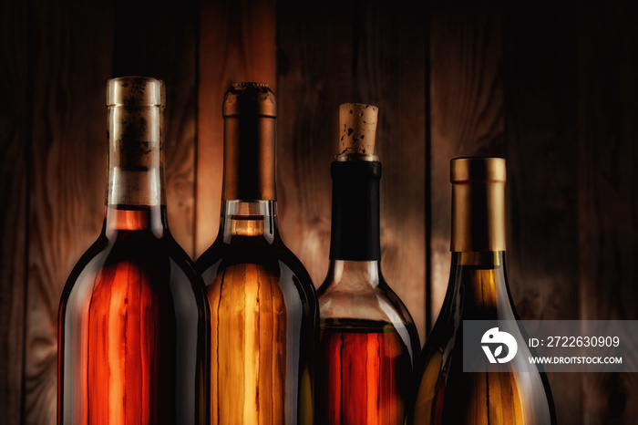 Wine Bottles Against Wood Background