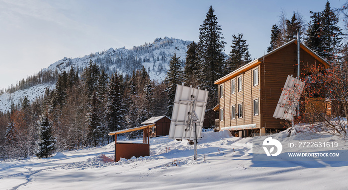 Brown wooden house tourist camp shelter over fantastic winter mountain view