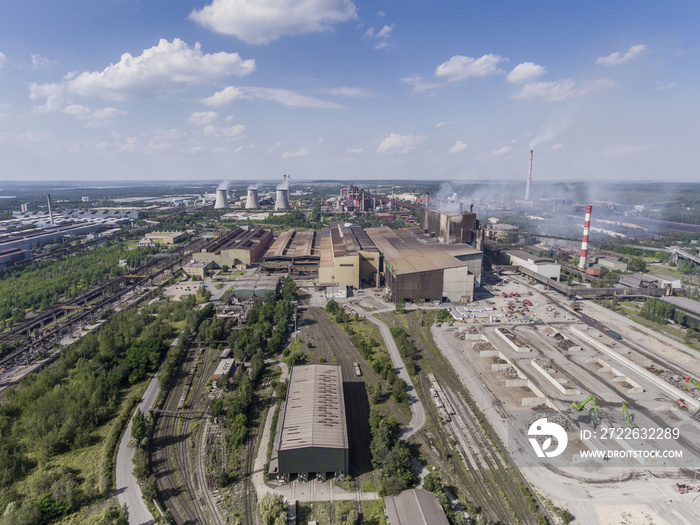 Steel factory with smokestacks at sunny day.Metallurgical plant.