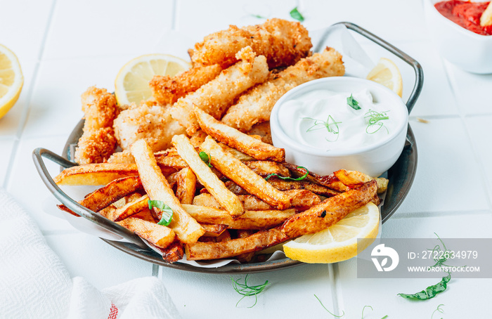 British Traditional Fish and chips with ketchup and tartar sauce