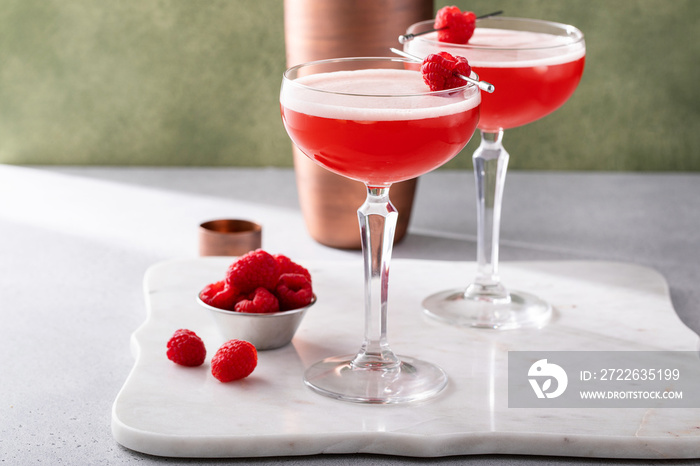 Raspberry martini cocktail with vodka, juice and raspberry liqueur