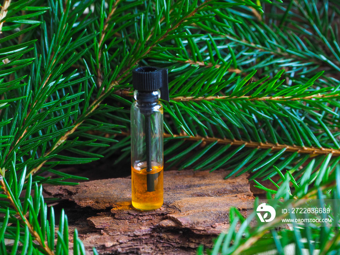 Natural fir oil in a mini bottle.