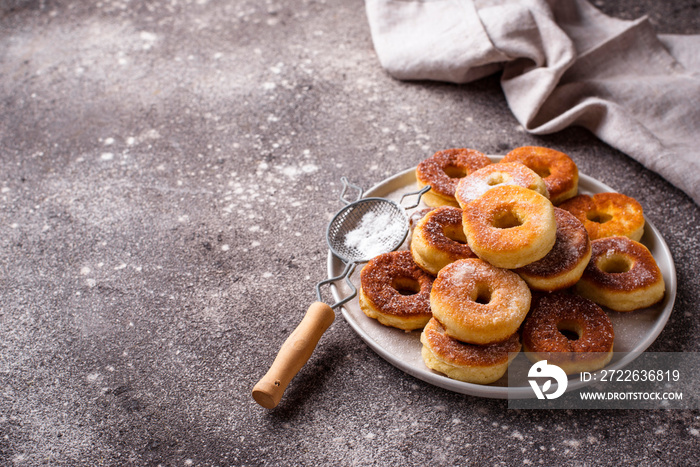 Homemade donuts with sugar powder