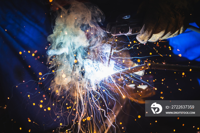 Man welder at work.