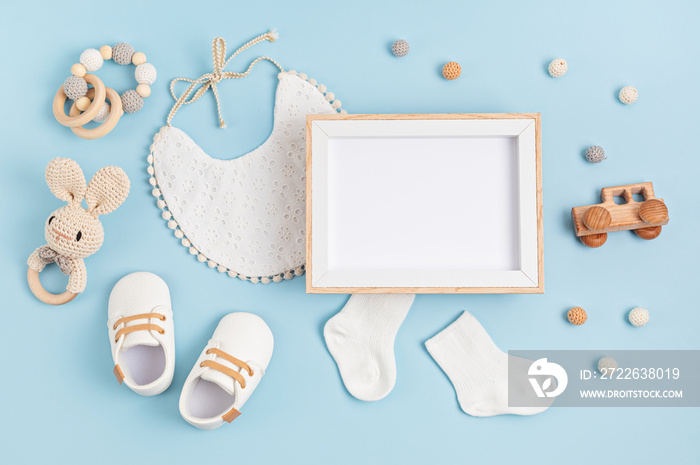 Mockup of empty frame with white baby accessories, baby shower, baptism invitation