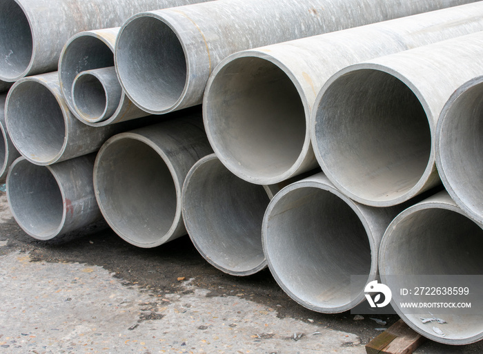 Pile of asbestos cement pipes, drainage pipes, asbestos pipes.