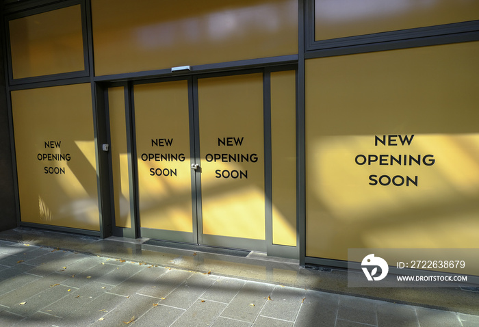 entrance to the store with text New opening soon. retail business open/start concept