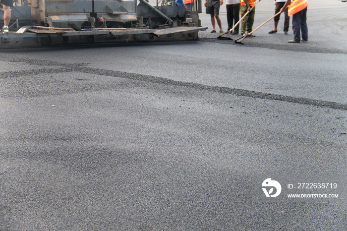 Municipal workers in paving