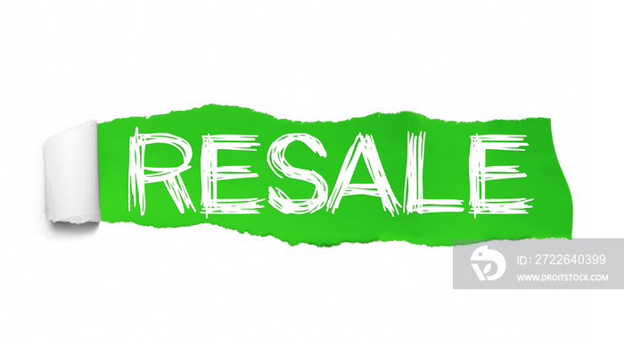 RESALE text, Inspiration, Motivation and Business concept on Green torn paper