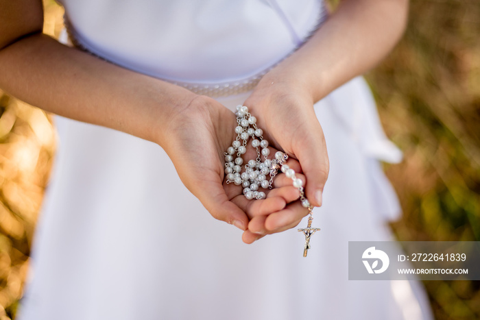 First communion, rosary. First Holy Communion concept.