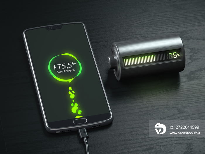 Charging of a mobile phone battery concept.  Smartphone and battery charge indicator on black wooden table.