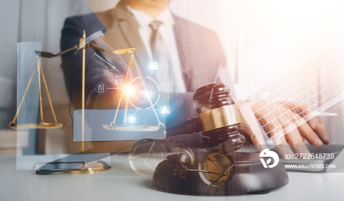 Male lawyer working with contract papers and wooden gavel on tabel in courtroom. justice and law ,attorney, court judge, concept.