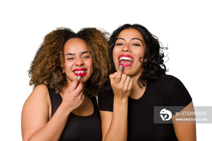 Two best friends, an Afro and Latina, get ready for a night out, laughing and having a great time while getting glam.