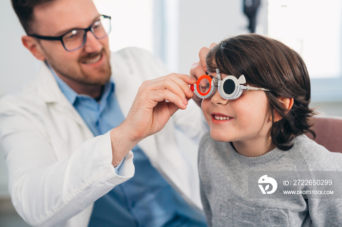 boy having eyesight test on clinic