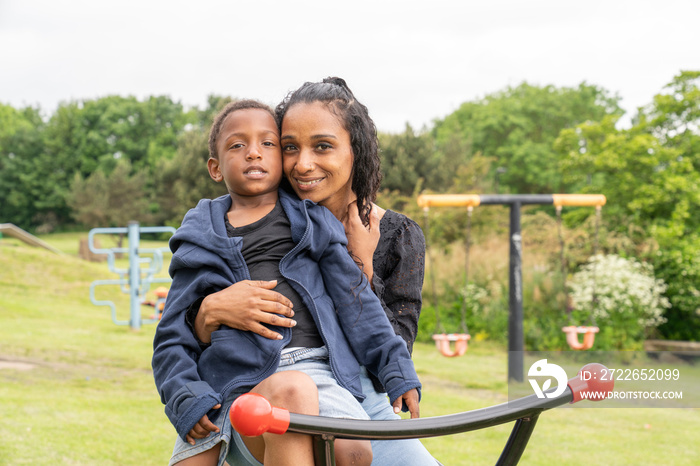 Portrait of mother and son at playground