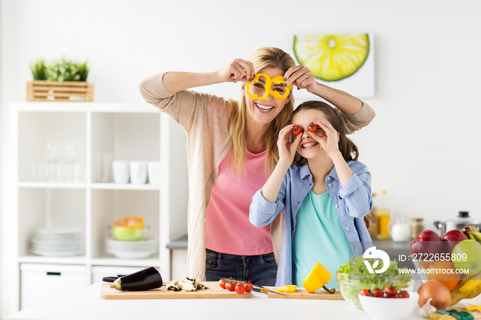 happy family cooking dinner at home kitchen